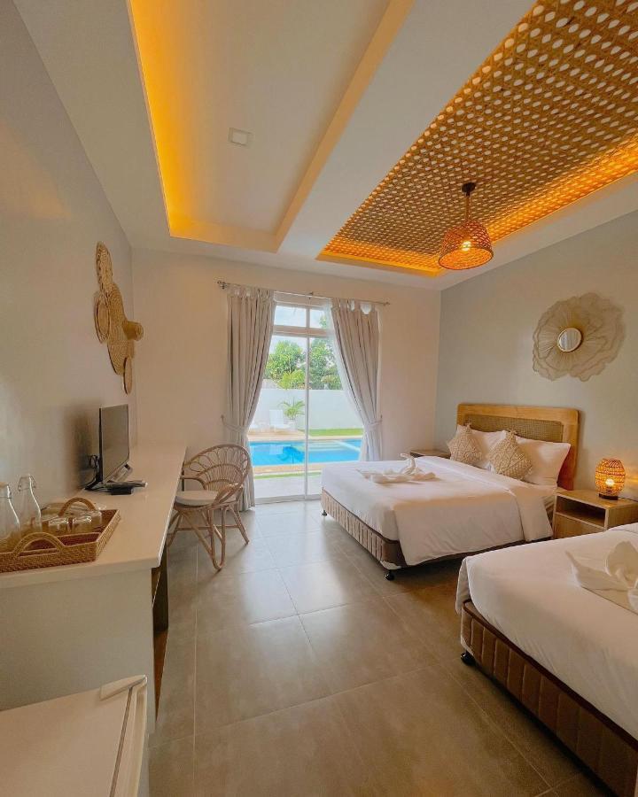 Anlio Resort Dauis Buitenkant foto